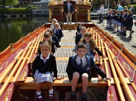 School children enjoying being on board the barge