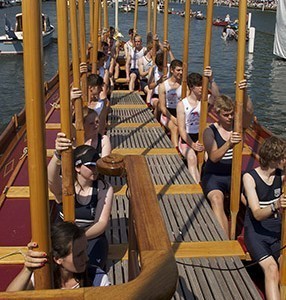 Completing their row on Gloriana at Henley Royal Regatta