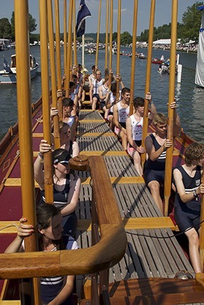 Completing their row on Gloriana at Henley Royal Regatta