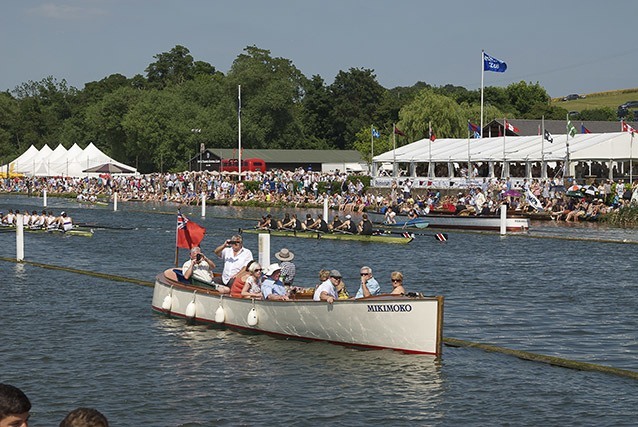 An upmire's launch seen from Gloriana at Henley Royal Regatta