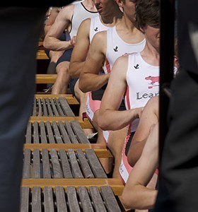 Young rowers rowing Gloriana at Henley Royal Regatta