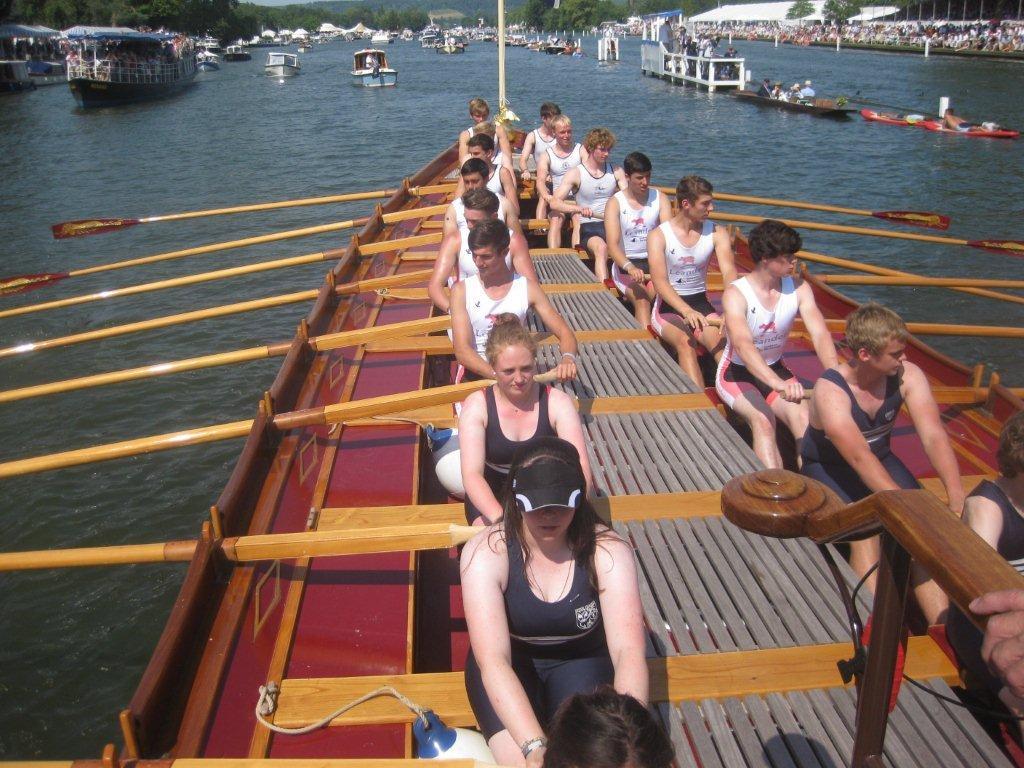 A Leander & Upper Thames mixed youth crew row Gloriana at HRR