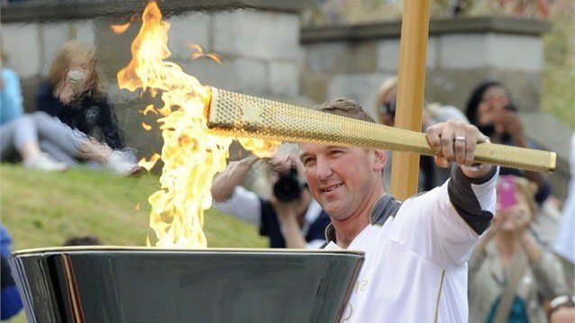 Matt lights the cauldron