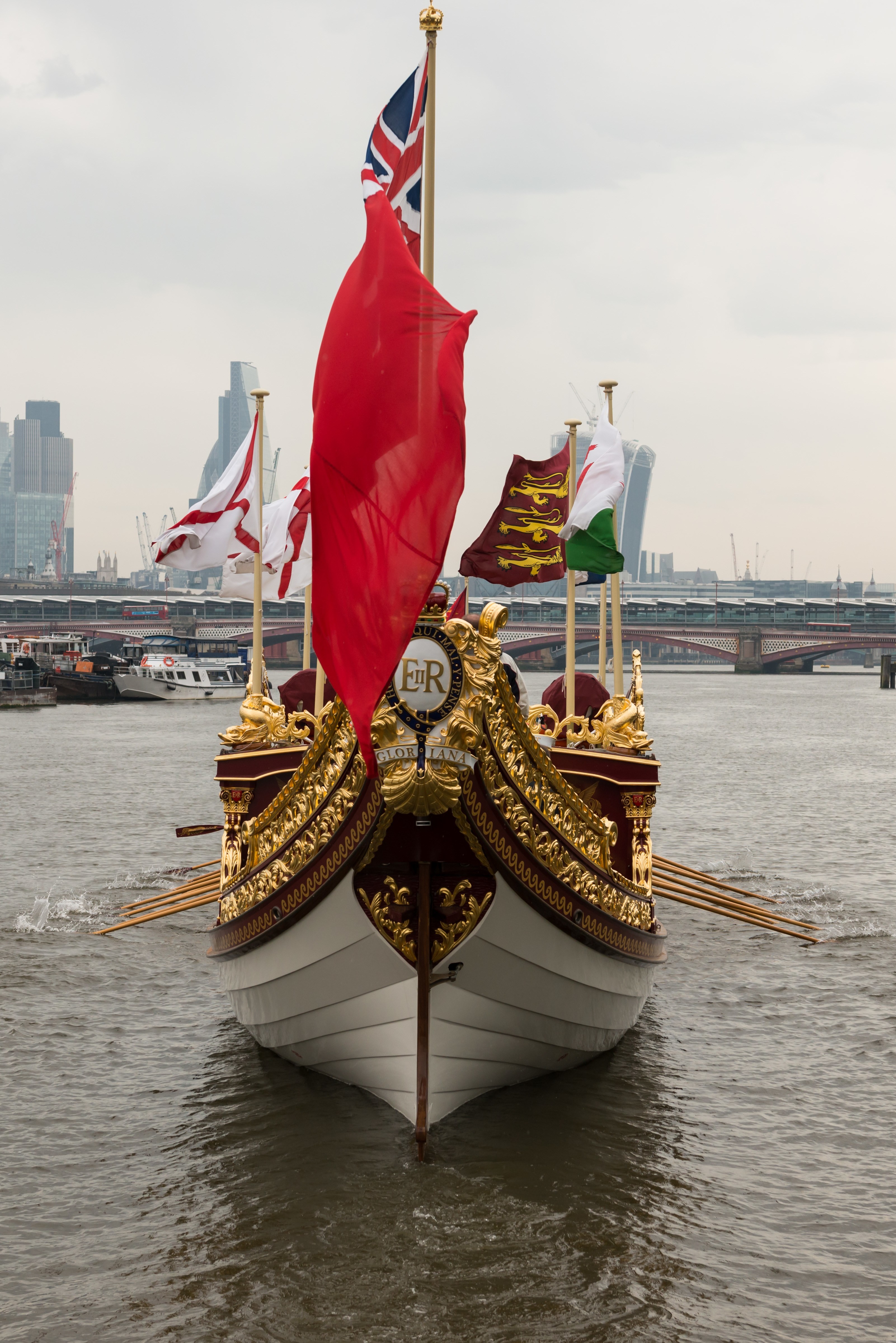 7/6/14. Commonwealth Baton Relay. The Queen's Royal Barge, 'Gloriana', is rowed up the Thames with the Commonwealth Baton aboard. Credit: Port of London Authority/TW/Ben Fitzpatrick.