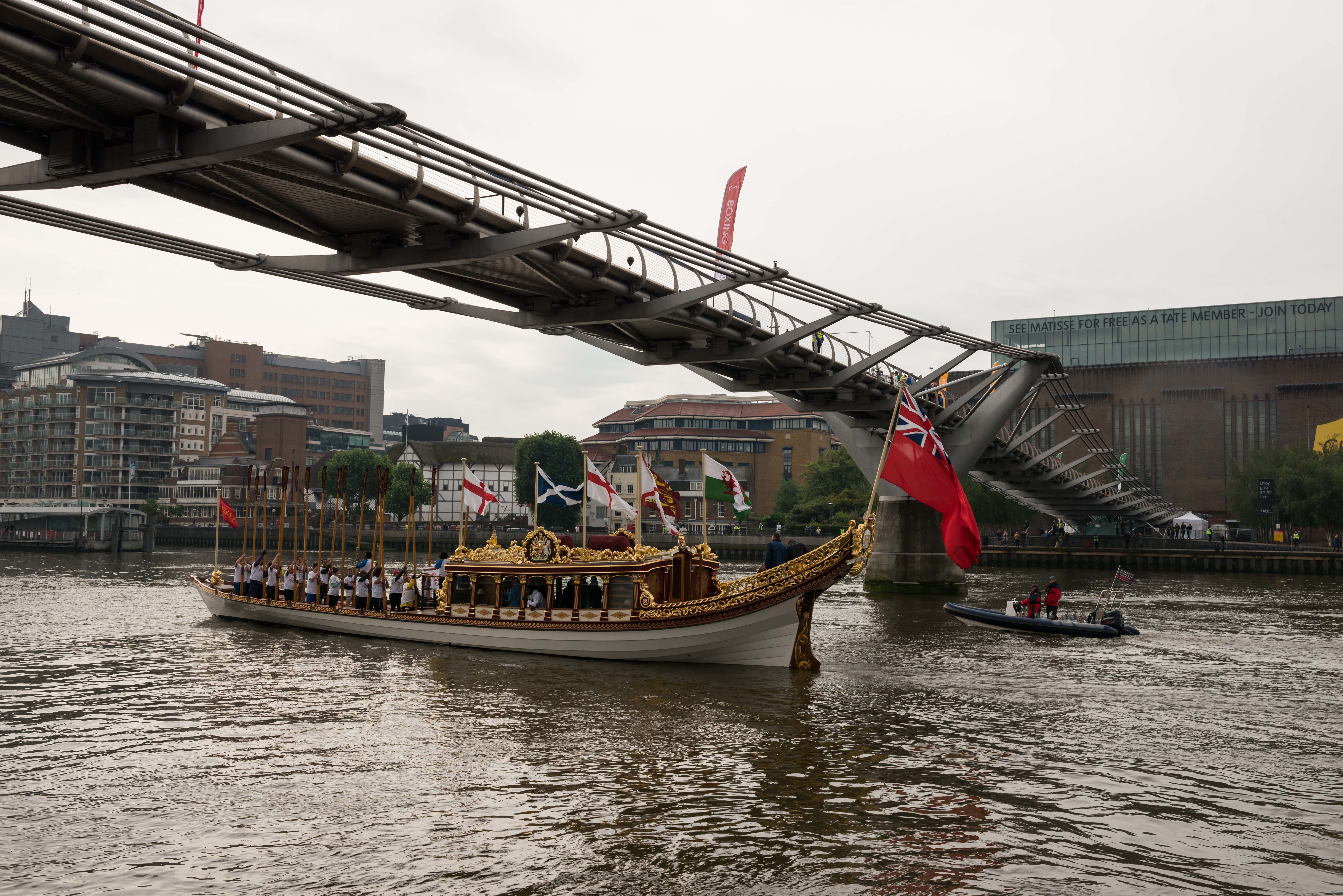 7/6/14. Commonwealth Baton Relay. The Queen's Royal Barge, 'Gloriana', is rowed up the Thames with the Commonwealth Baton aboard. Credit: Port of London Authority/TW/Ben Fitzpatrick.