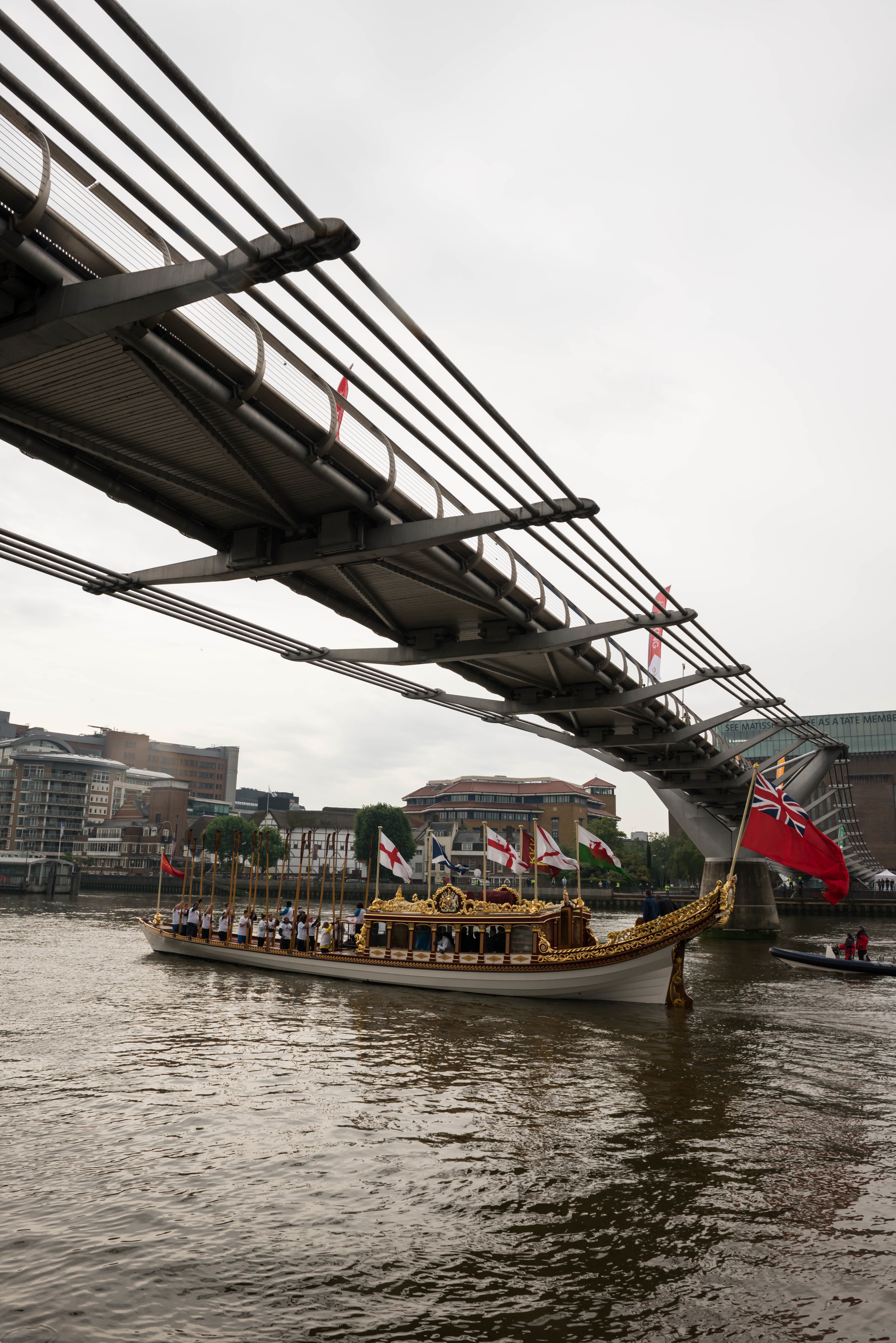 7/6/14. Commonwealth Baton Relay. The Queen's Royal Barge, 'Gloriana', is rowed up the Thames with the Commonwealth Baton aboard. Credit: Port of London Authority/TW/Ben Fitzpatrick.