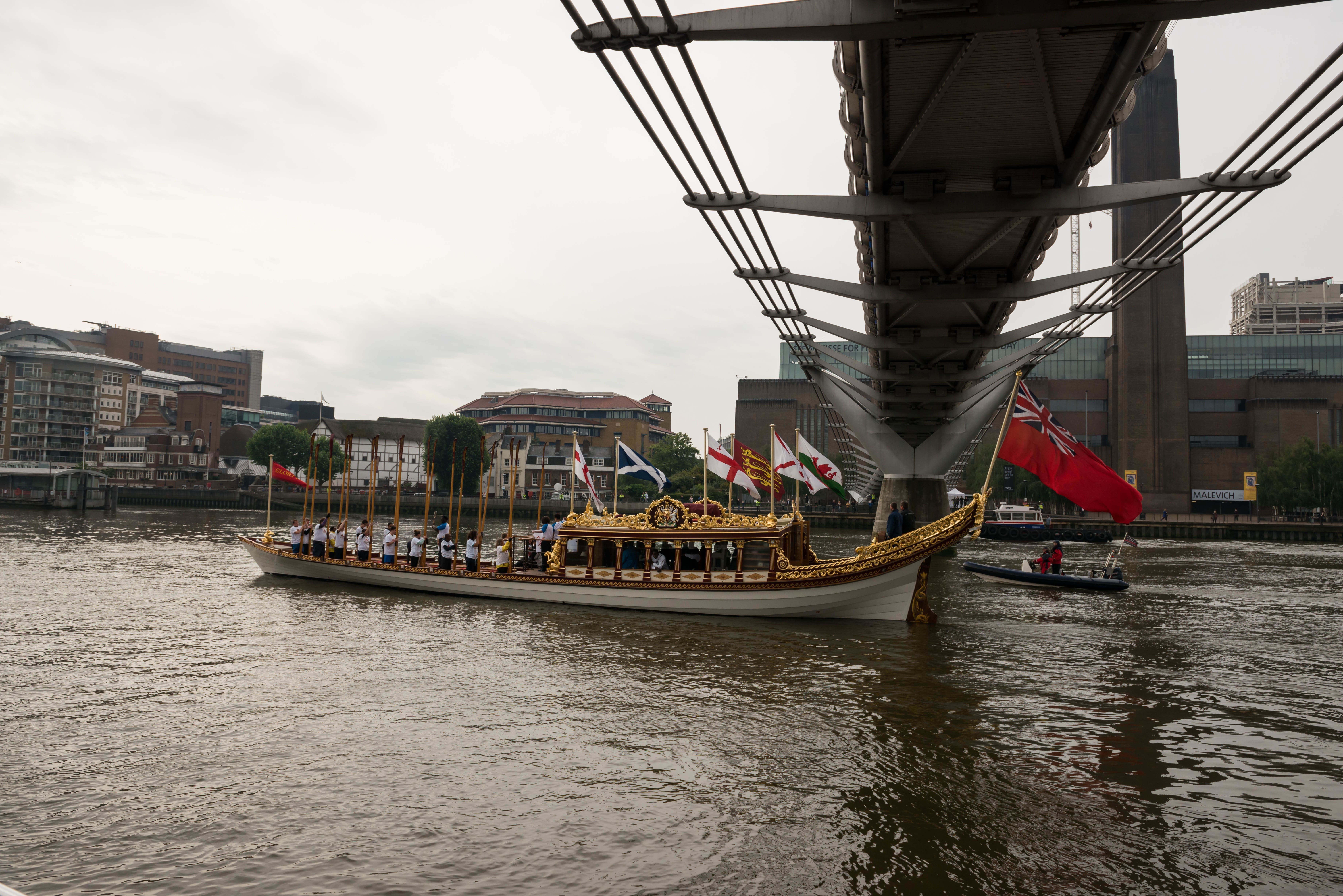 7/6/14. Commonwealth Baton Relay. The Queen's Royal Barge, 'Gloriana', is rowed up the Thames with the Commonwealth Baton aboard. Credit: Port of London Authority/TW/Ben Fitzpatrick.