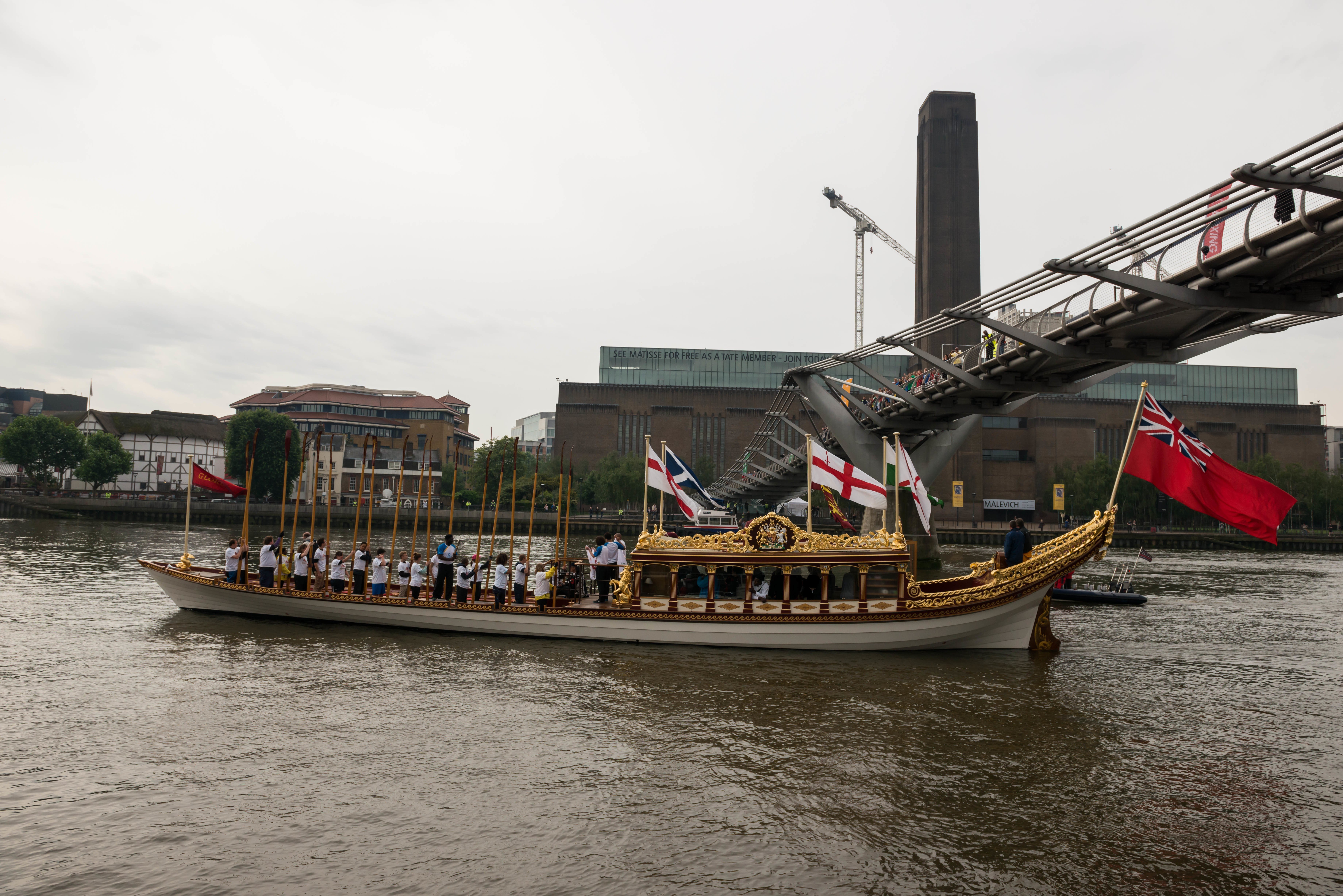 7/6/14. Commonwealth Baton Relay. The Queen's Royal Barge, 'Gloriana', is rowed up the Thames with the Commonwealth Baton aboard. Credit: Port of London Authority/TW/Ben Fitzpatrick.