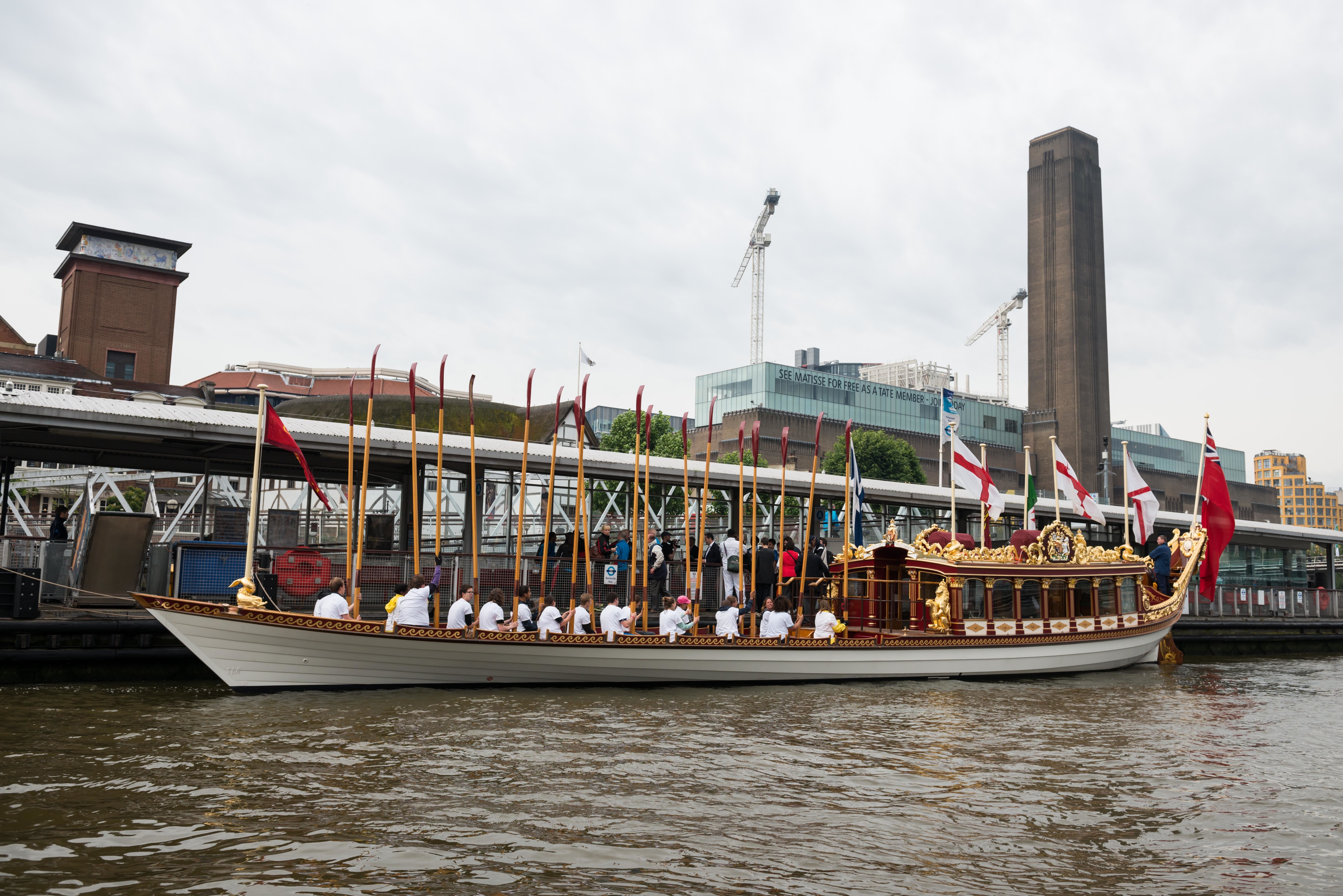 7/6/14. Commonwealth Baton Relay. The Queen's Royal Barge, 'Gloriana', is rowed up the Thames with the Commonwealth Baton aboard. Credit: Port of London Authority/TW/Ben Fitzpatrick.