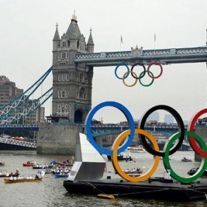 The Olympic Rings Barge and escort