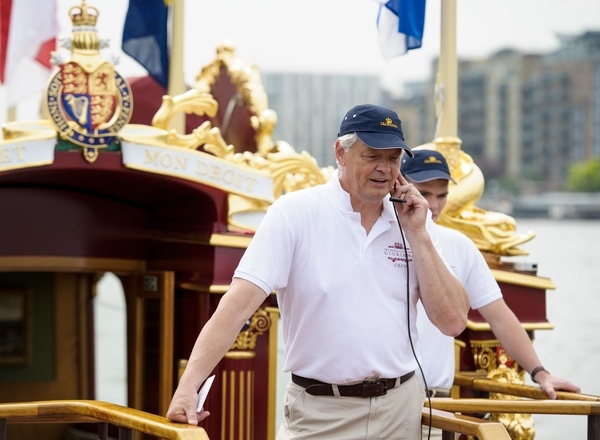 Matthew Gordon, the Cox on board the MV Gloriana as it rows up the Thames as part of HM The Queen's 90th Birthday celebrations