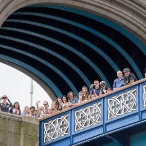 The public watch the Gloriana MV Gloriana rows up the Thames as part of HM The Queen's 90th Birthday celbrations