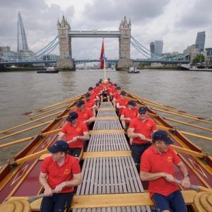 MV Gloriana rows up the Thames as part of HM The Queen's 90th Birthday celbrations