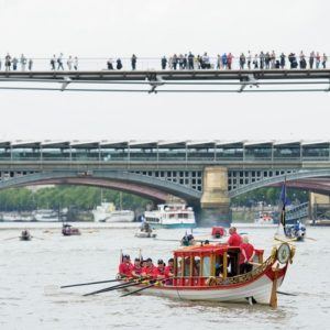 The small boat flotilla behind the Gloriana