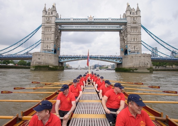 MV Gloriana rows up the Thames as part of HM The Queen's 90th Birthday celbrations