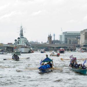 The small boat flotilla behind the Gloriana