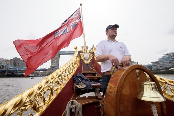 MV Gloriana rows up the Thames as part of HM The Queen's 90th Birthday celbrations