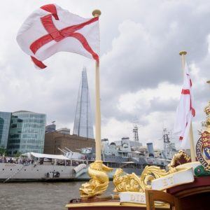 The Gloriana passes HMS Belfast MV Gloriana rows up the Thames as part of HM The Queen's 90th Birthday celbrations