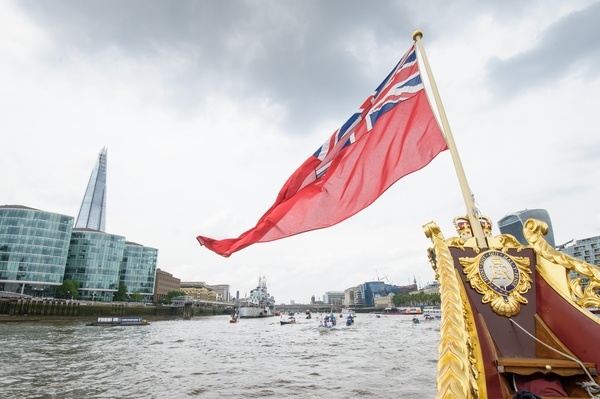 The Gloriana passes HMS Belfast