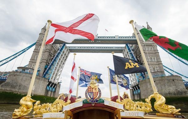 The Gloriana passes HMS Belfast