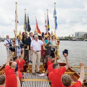 The crew of The Gloriana give three cheers to the Queen